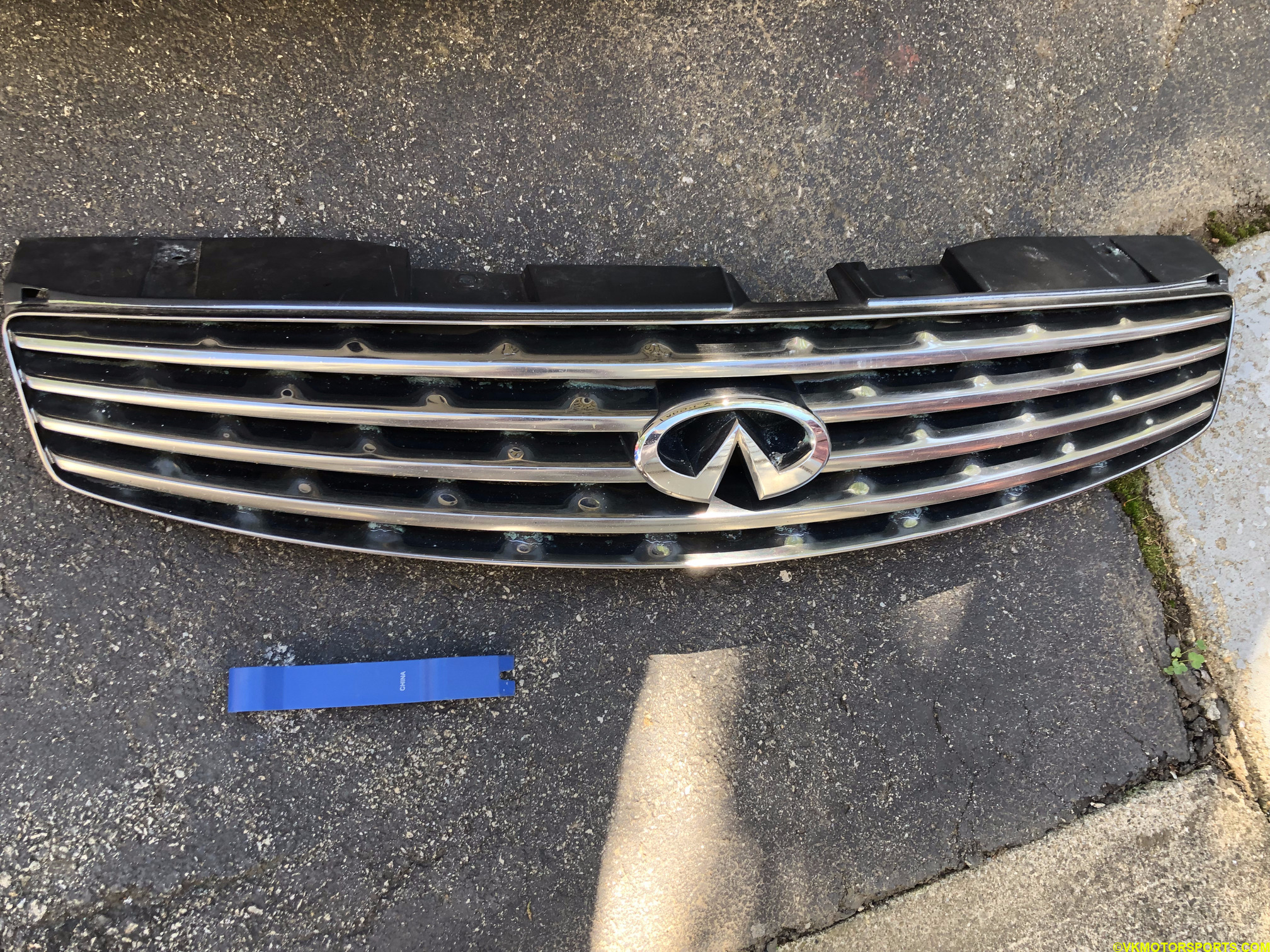 Figure 1. Grille removed with a blue trim removal tool from Harbor Freight