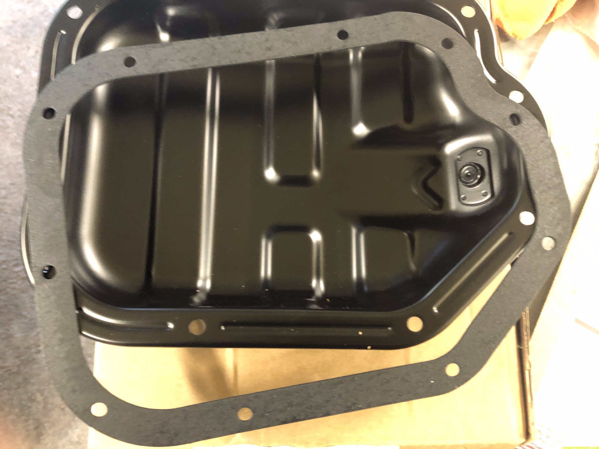 Figure 3. New Oil Pan and Gasket