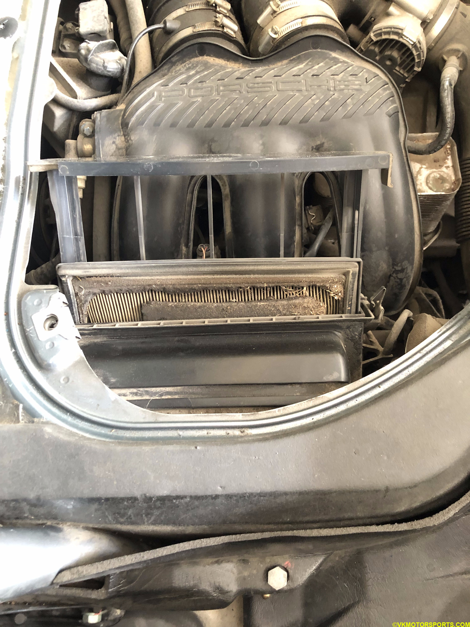 Figure 13. Pull air filter housing up