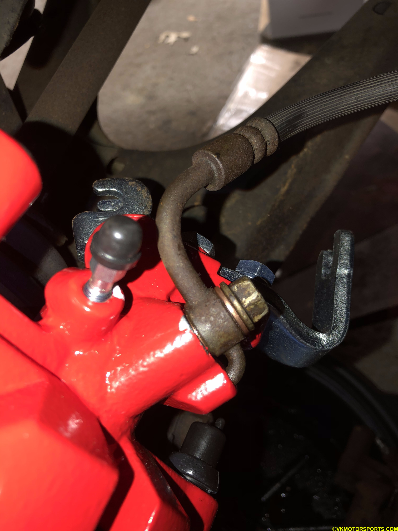 Brake line installed on the rear caliper on the driver's side