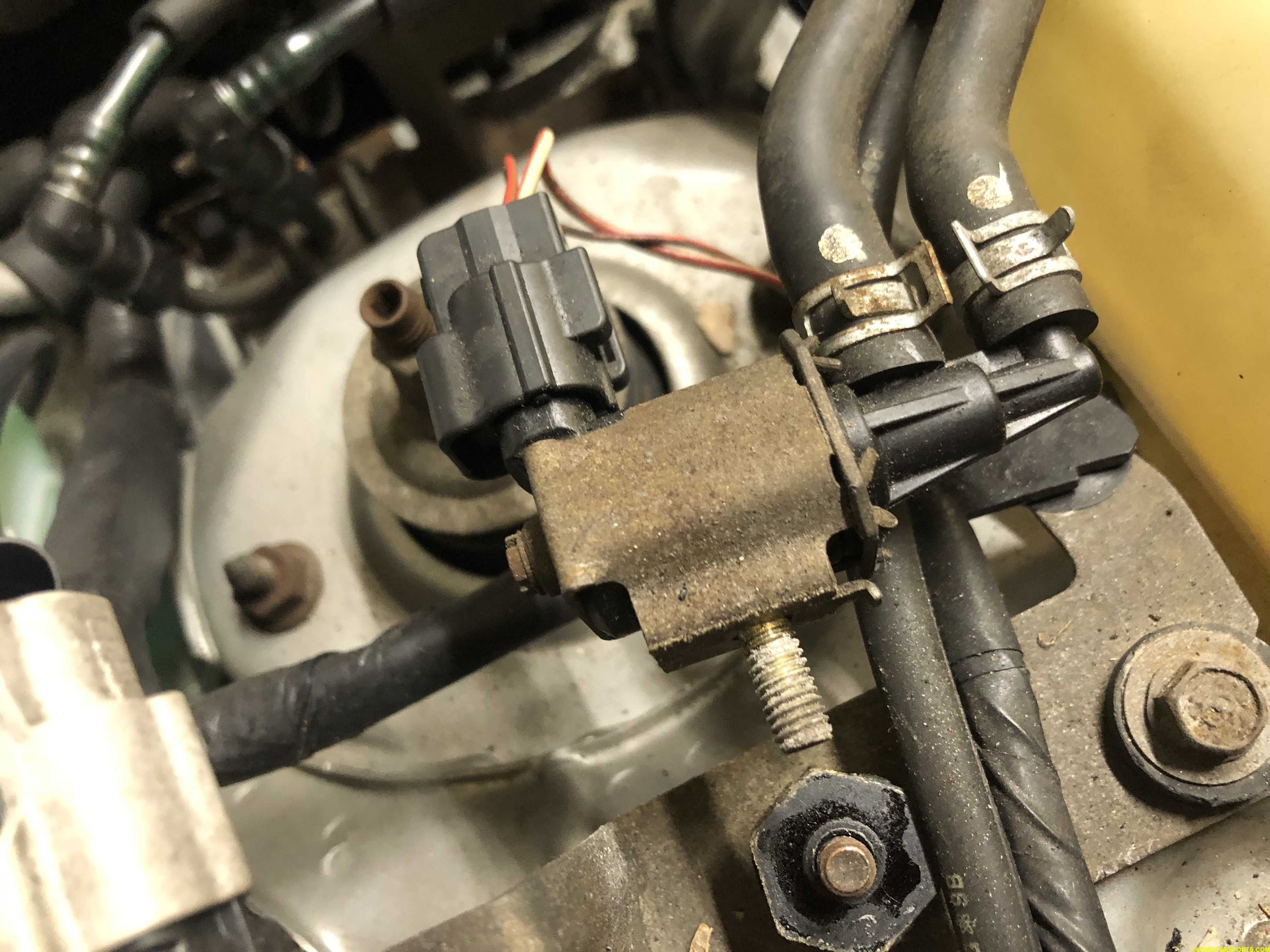 Figure 10. Purge valve bracket removed