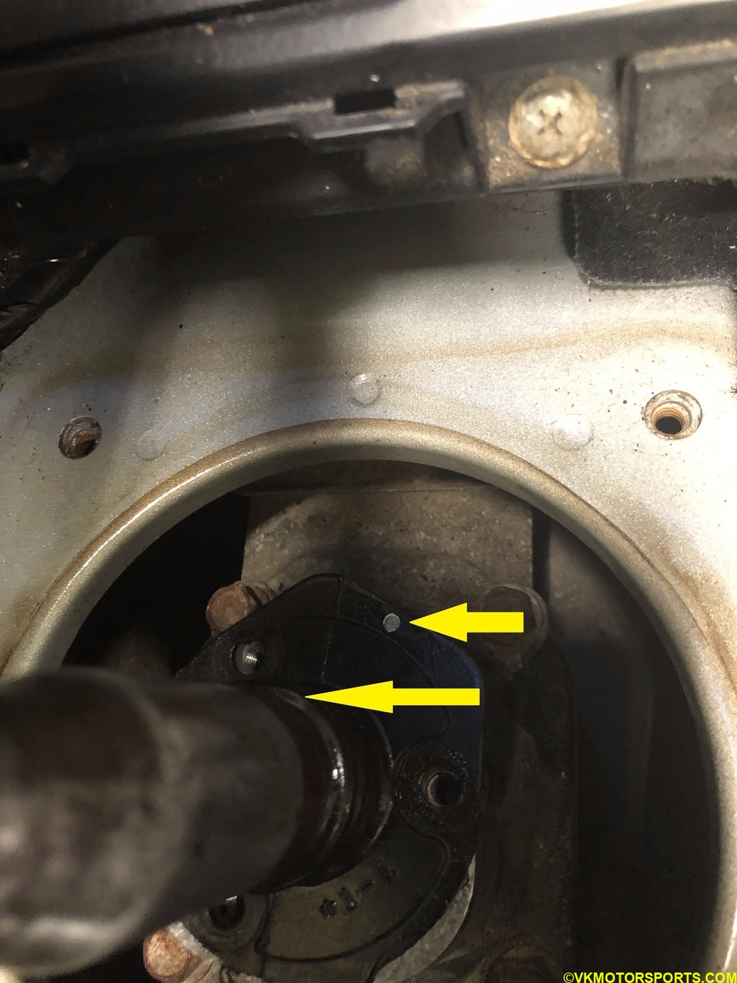 Figure 11c. Align the white spots and the bolt holes