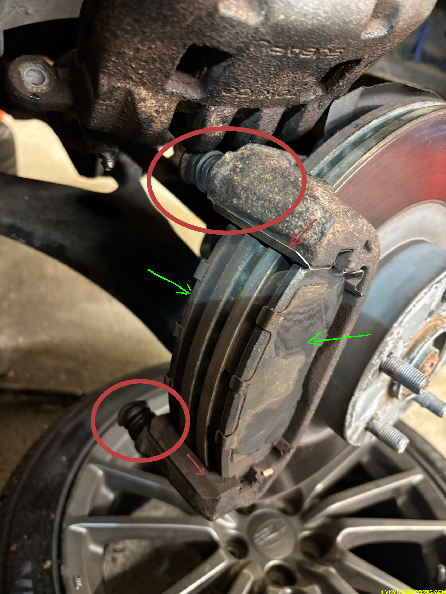Figure 4. Front caliper with both bolts removed