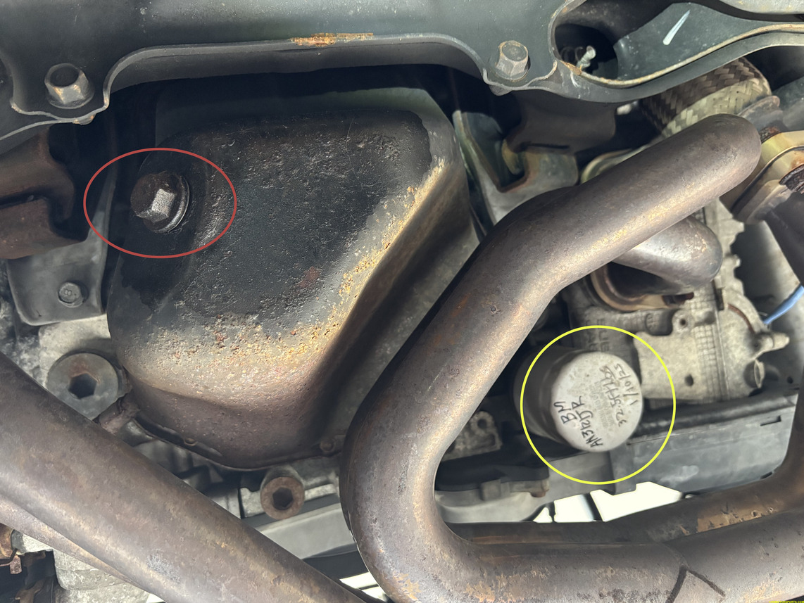 Figure 1. View of the undercarriage with oil drain pan bolt and oil filter