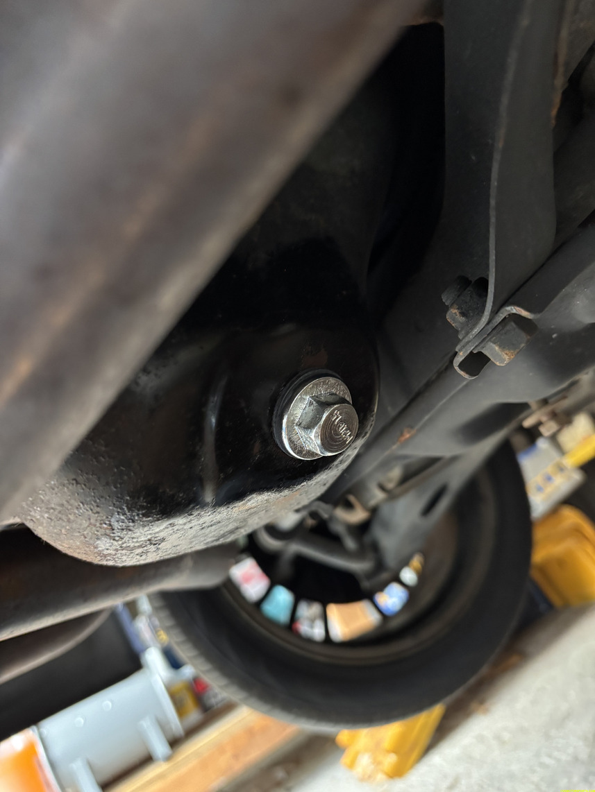 Figure 6. New drain bolt and washer installed